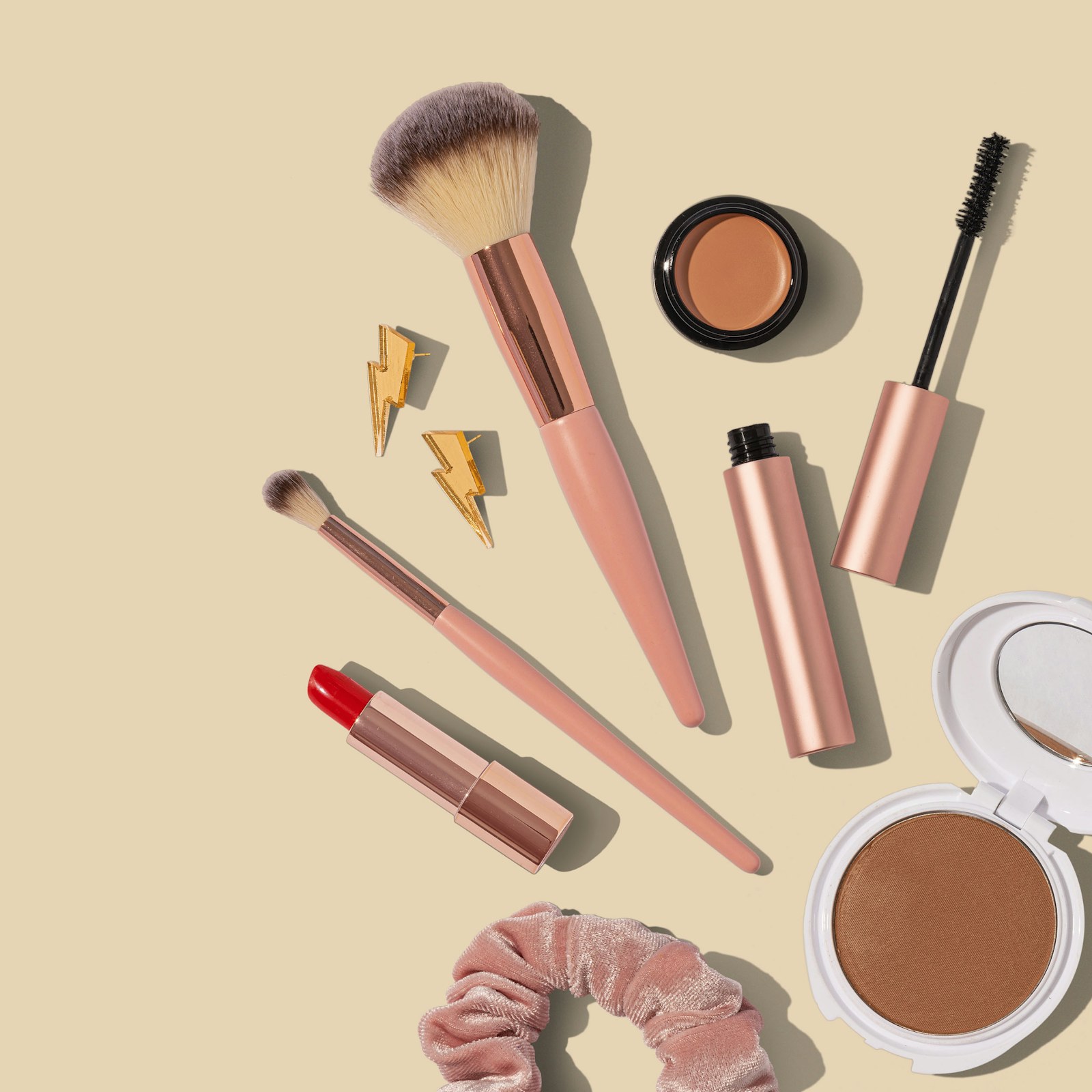 A clean bathroom vanity with simple facial care tools